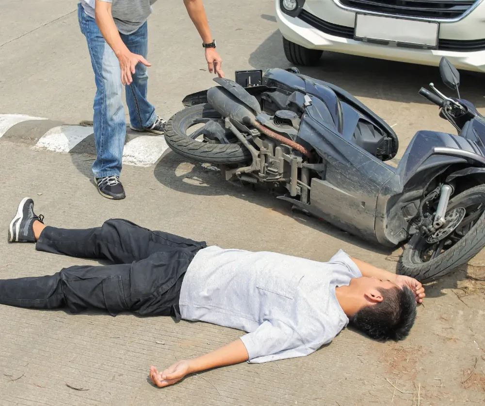 Motorcyclist on a roadway.